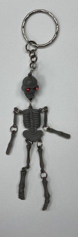 LLAVERO ESQUELETO PEQUENO GRIS OSCURO